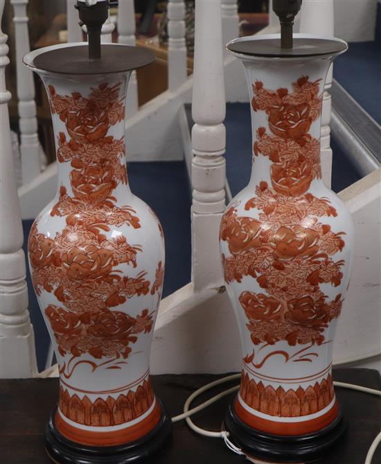 A pair of Chinese style porcelain table lamps and shades